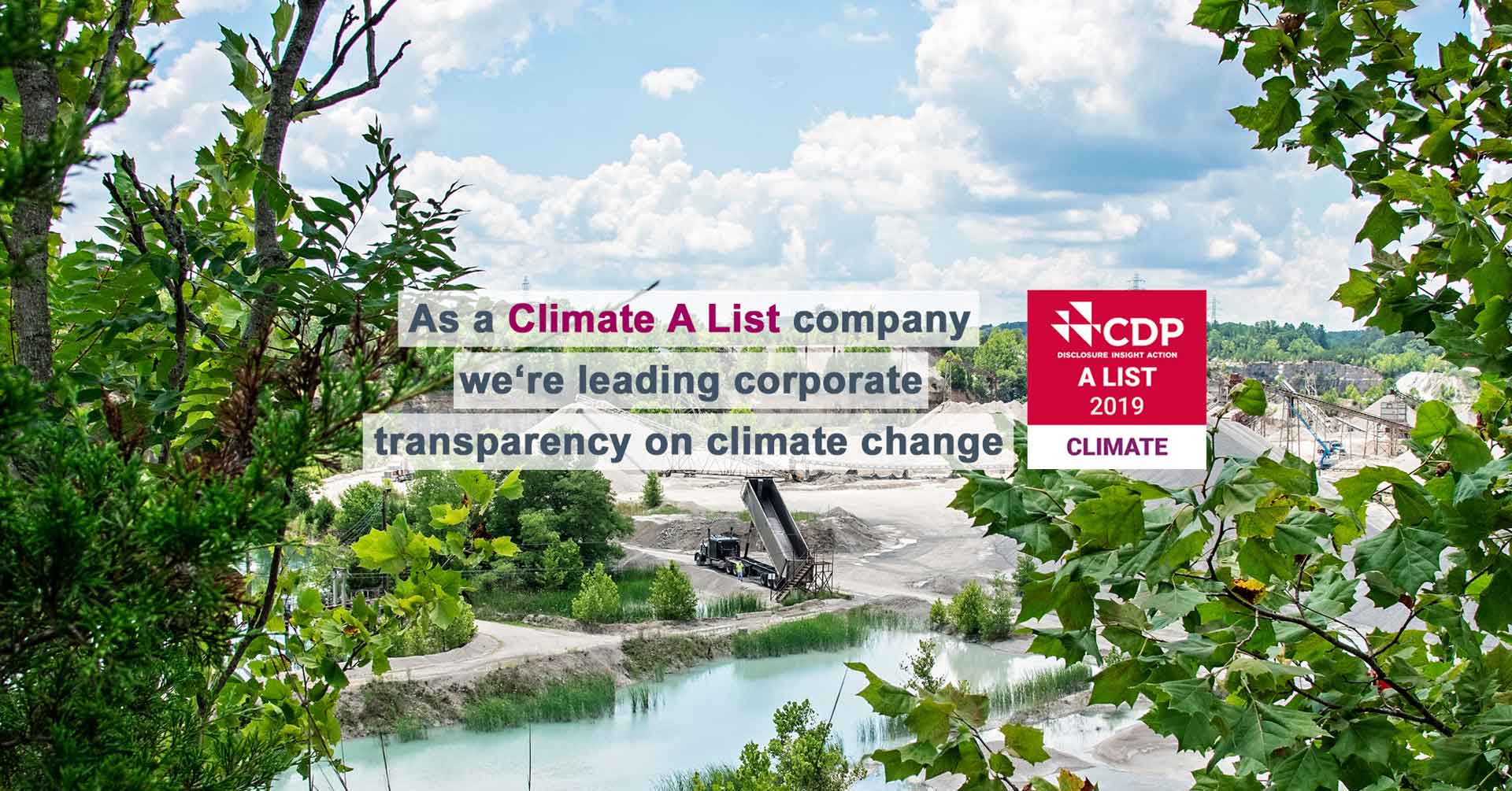 A scenic view juxtaposing nature with industry, highlighting a company’s pledge as a Climate A List entity for corporate transparency on climate change, accompanied by CDP 2019 Climate A List logos.