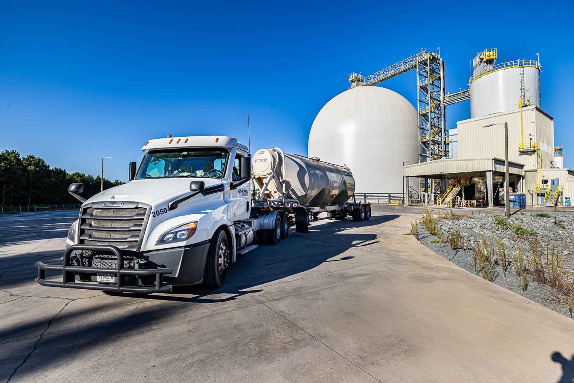 Truck in front of a facility