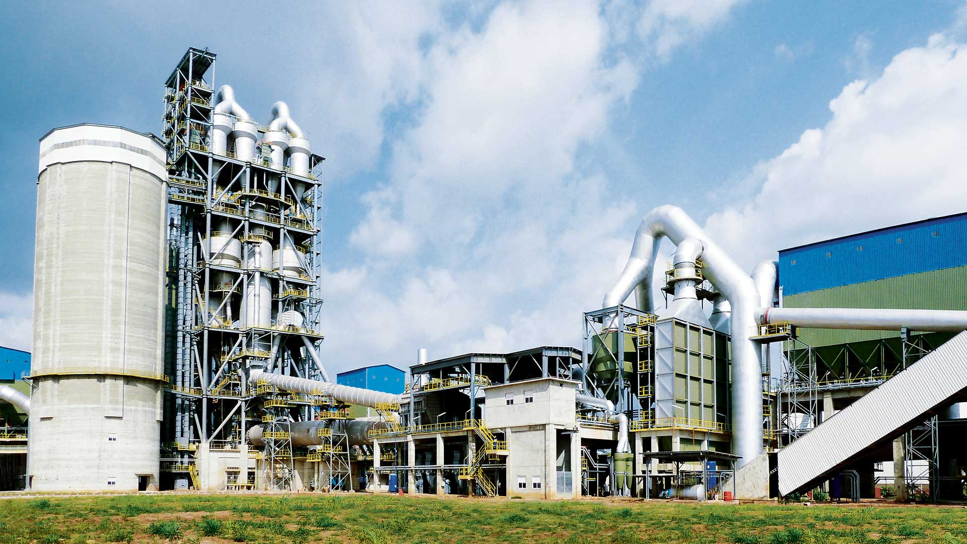 A clinker plant in Togo against a cloudy sky